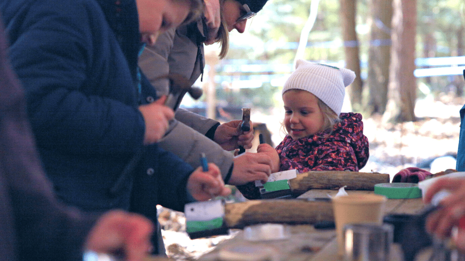 a girl trying a craft
