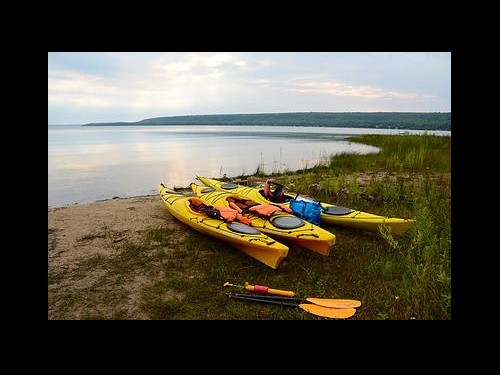Kayaks on shoreline