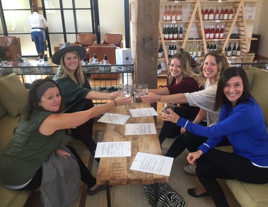 Girls enjoying a fun afternoon of wine tasting and friendship.