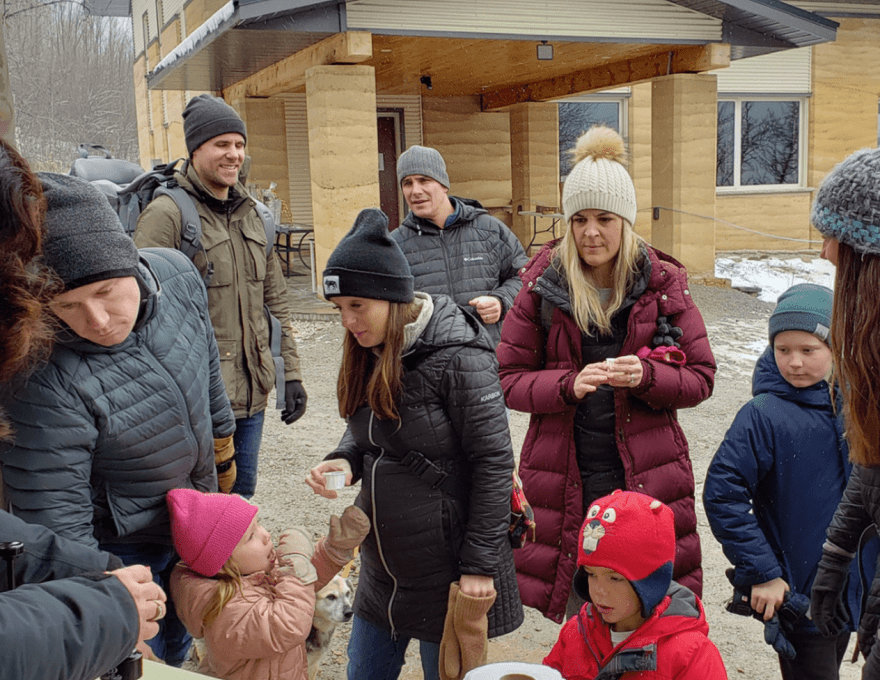 people attending maple syrup festival