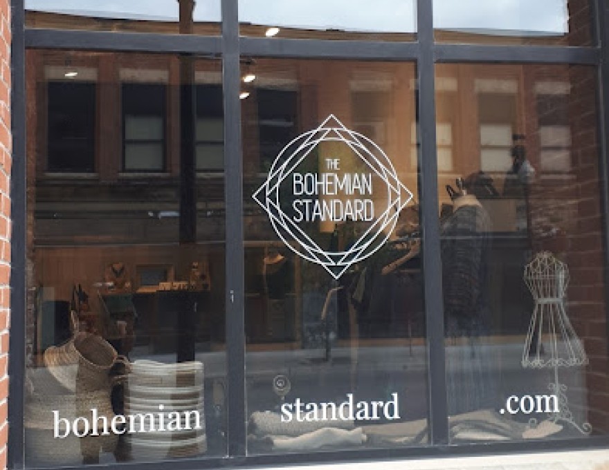 Exterior view of window with store logo stating name "The Bohemian Standard"