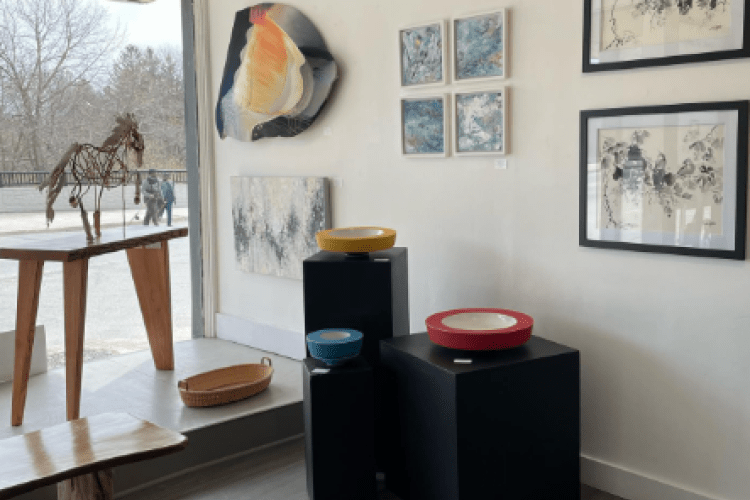 art gallery with paintings and sculptures