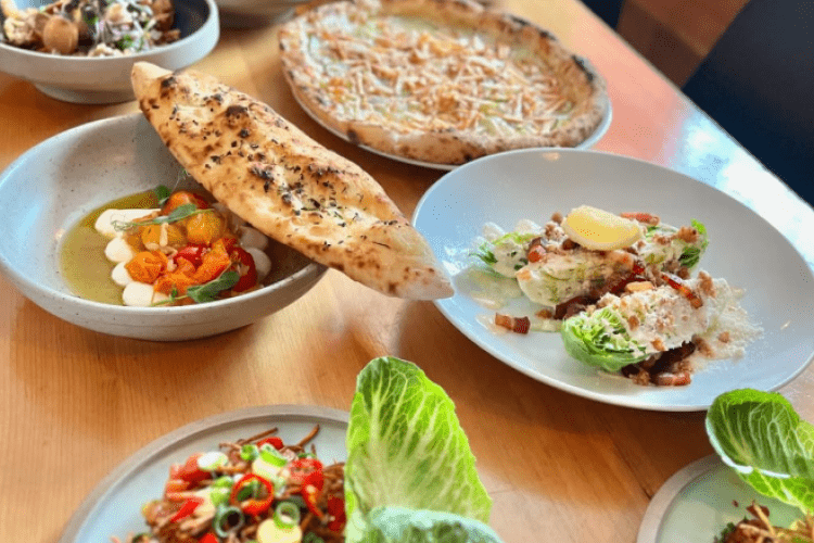 a table full of beautiful plates of food