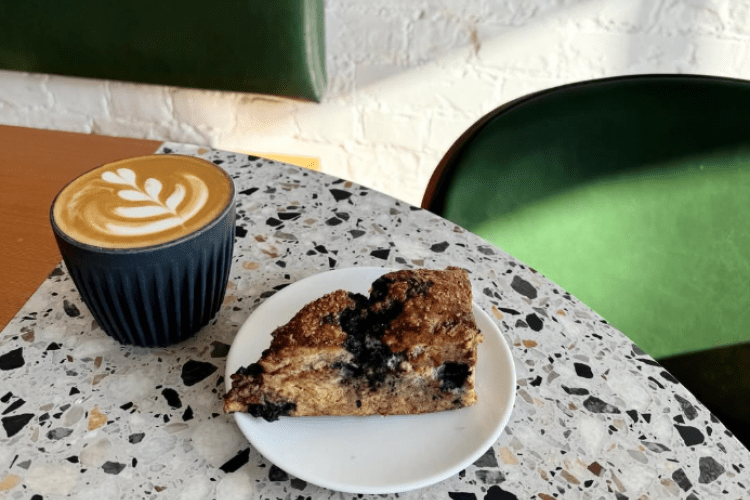 a table with a late and pastry on it