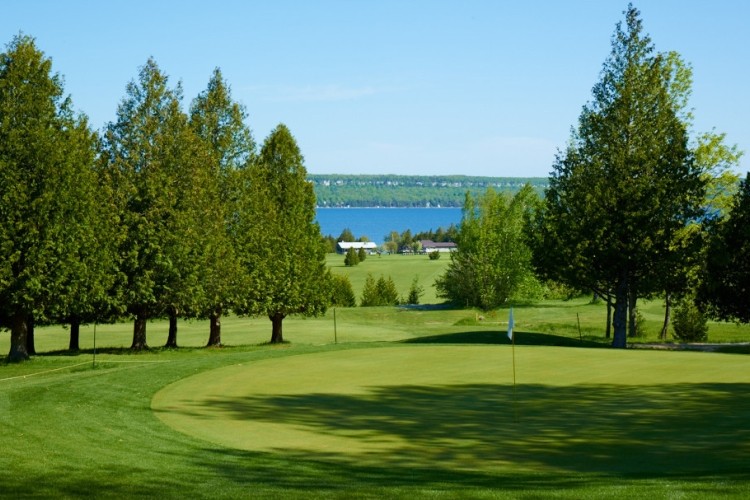 Our club offers a very scenic course that is backed by the Niagara Escarpment and overlooks Colpoys Bay with an Escarpment Cliff