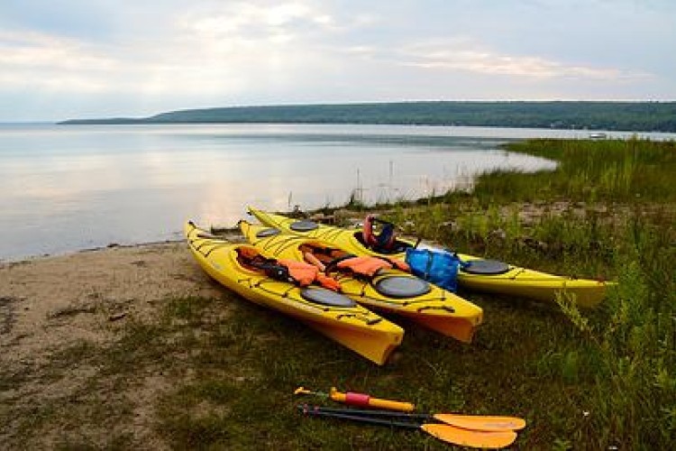 Kayaks on shoreline