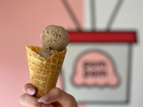 Someone holding ice cream
