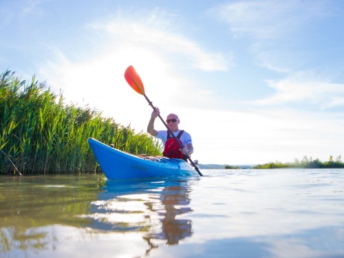 Man kayaking on water