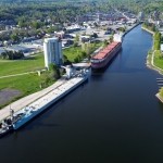 A drone photo looking south towards Owen Sound's Harbour. Two freighters are in the port.