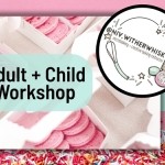 Boxes of pink macarons on a light surface with a teal overlay reading “Adult + Child Workshop.” A circular logo on the right shows baking illustrations and text: “@Niv.WitherWhisk – microbakery + creative baking instructor.” Bottom border features colorful sprinkles.