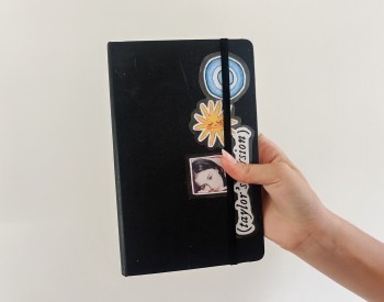 Someone holding journal