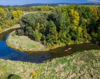 someone kayaking on a river