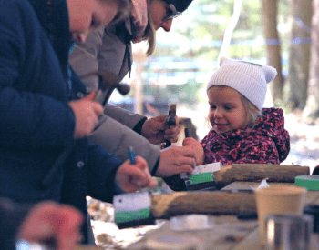 a girl trying a craft