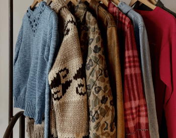 a rack of sweaters 
