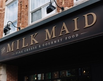 Exterior Milk Maid sign